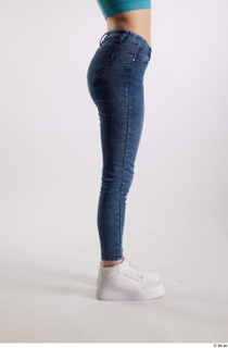 Rada  1 blue jeans casual dressed flexing leg side…